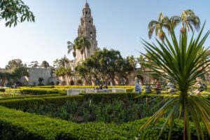 California Tower rising above gardens and palm trees in Balboa Park, San Diego