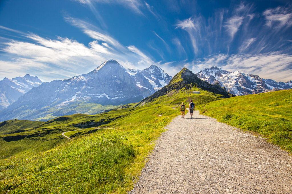 Two Hikers on a Mountain Trail | Harmony Mindful Breakthrough Specialists Two Hikers on a Mountain Trail